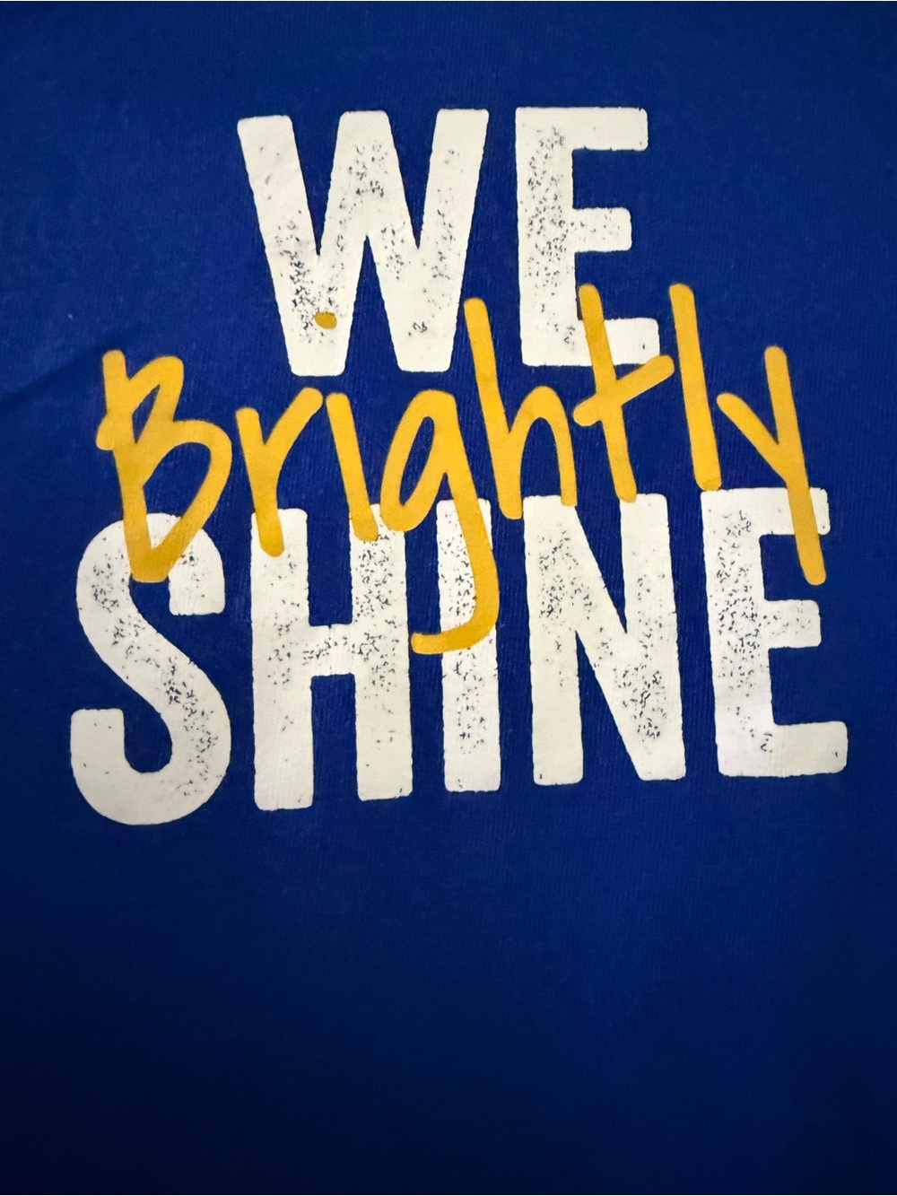 💛 Rabbit Skins Blue Graphic Tee with White and Yellow 'We Brightly Shine' Print